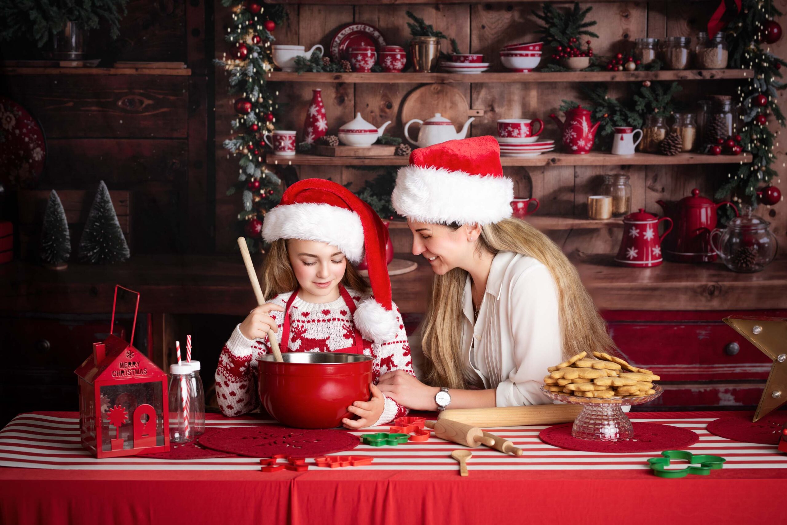 Mummy and child baking gingerbread for the Christmas card photos