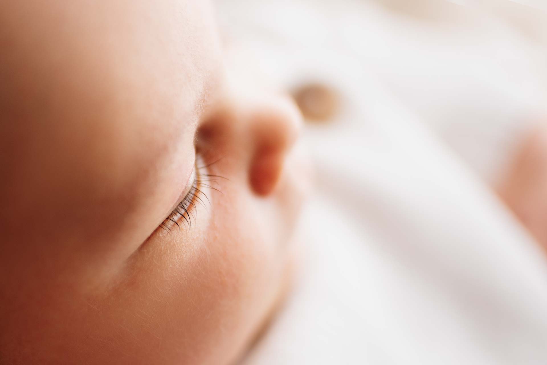 Close up photo of newborn baby boy's eye lashes