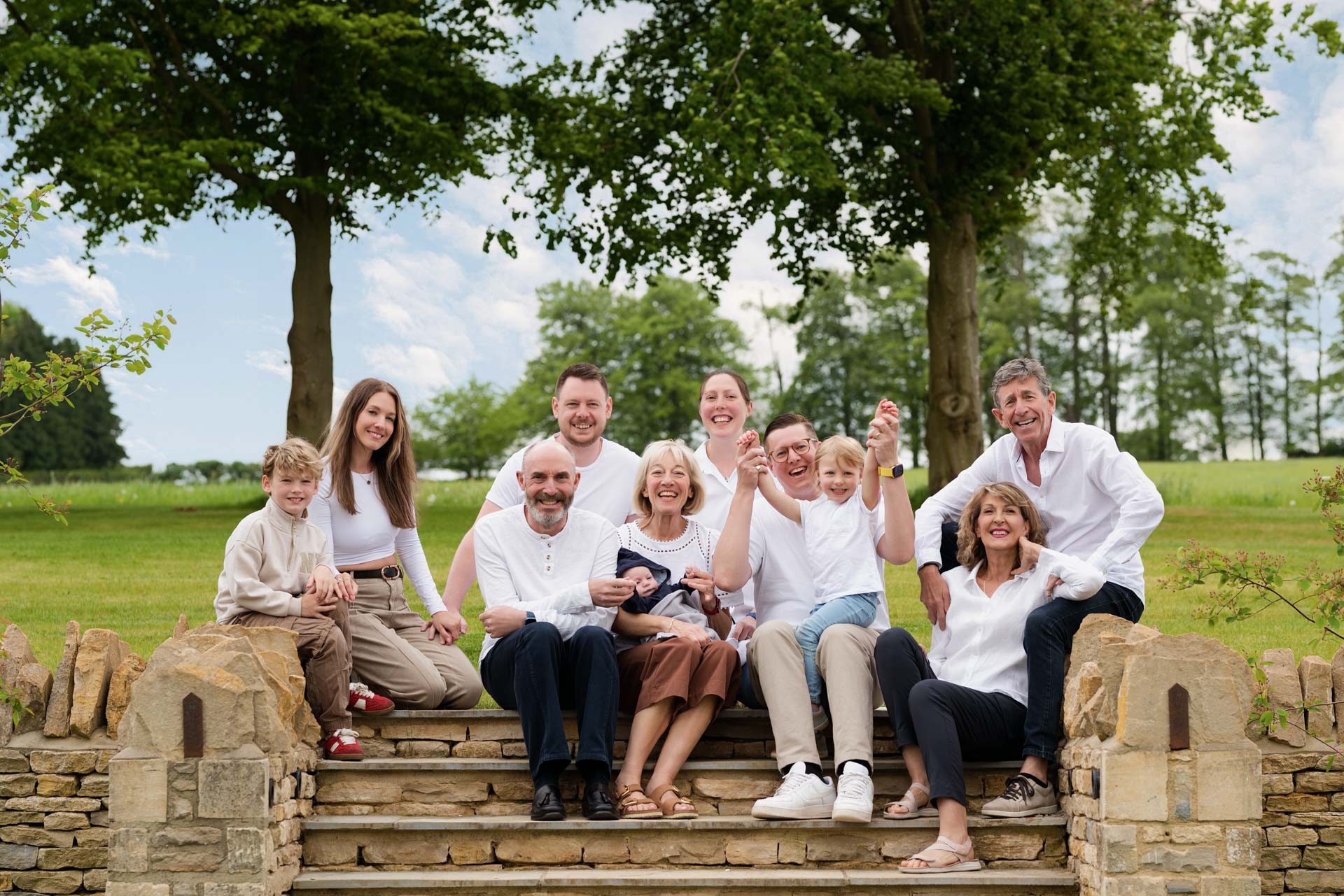 Three generations of a family gathered together to celebrate a 60th birthday with some professional photos to record the big day.