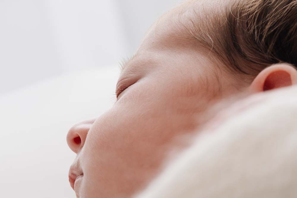 Close up photo of a newborn baby's eyebrows