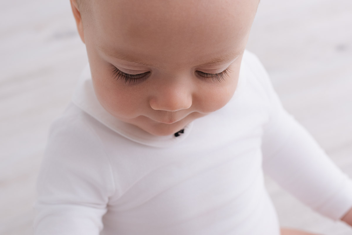 Close up photograph highlighting young boy's long eyelashes