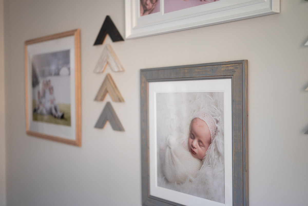 Frame samples hung on the family photography studio in Oxfordshire for their prices page